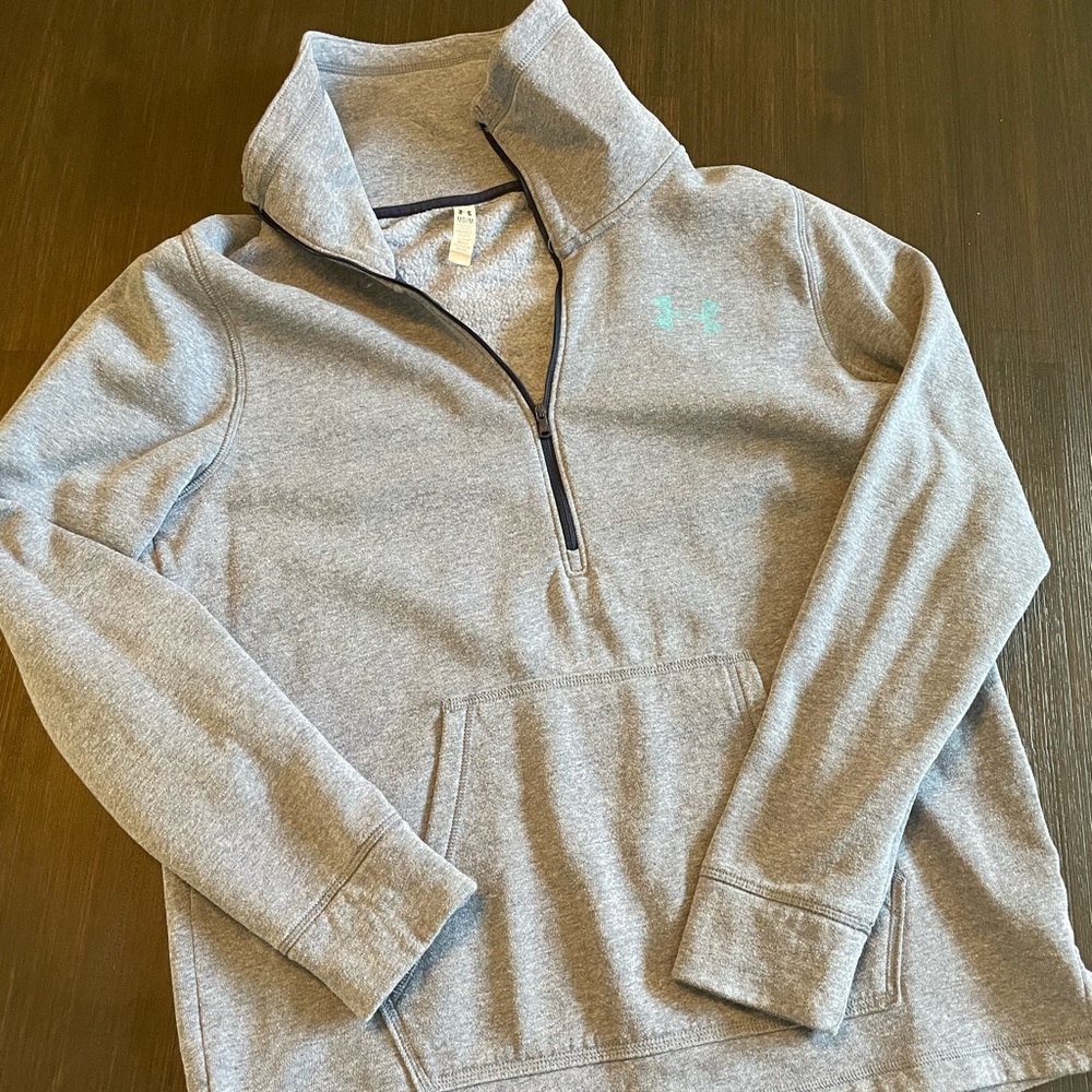 Under Armour 1/2 zip pullover, size medium. Heathered Navy almost gray color.